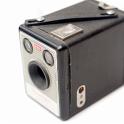 Old vinatge box camera on a white background, high angle view with shallow dof
