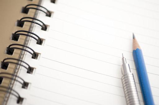blank notepad paper and pencil