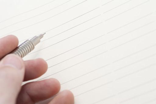 blank writing paper and pencil