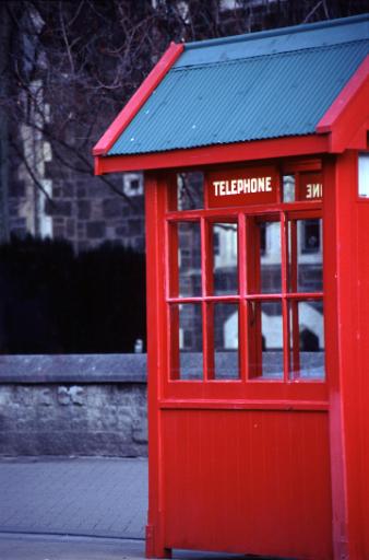 old wooden telephone box