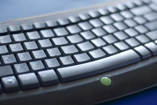 computer keyboard in blue light