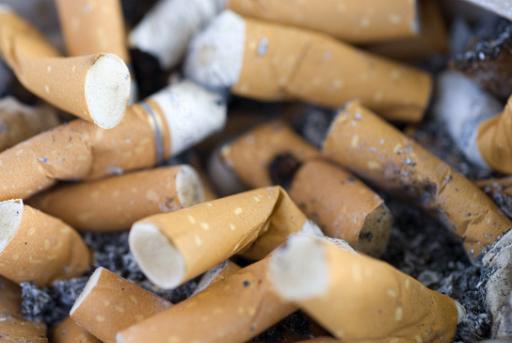 ashtray full of cigarette butts