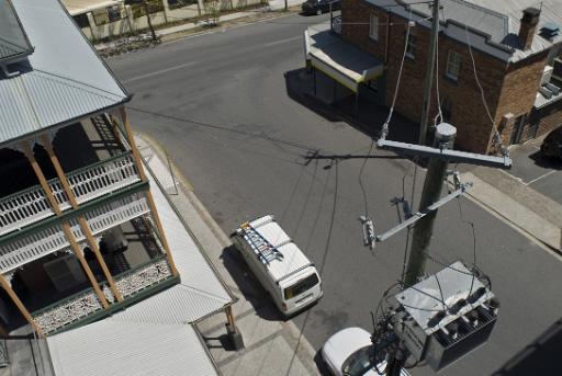 looking down on cables and an electric transformer